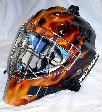Hockey goalie mask with fiery flame design and metal cage.